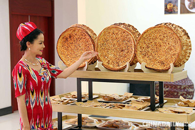 Изготовление лепешек наан стало крупным бизнесом в Синьцзяне