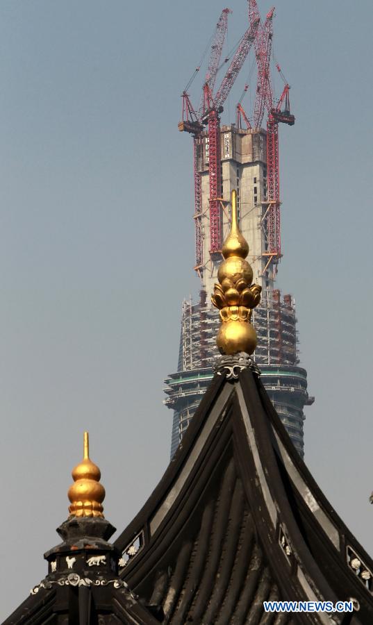 Высота строящегося в Шанхае небоскреба превысила 500 м (6)