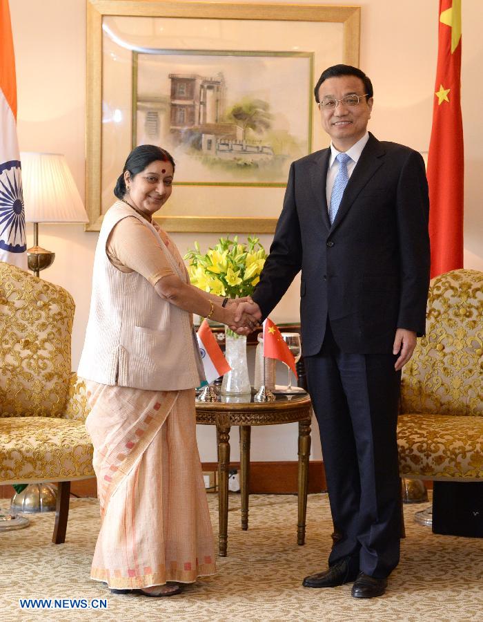 Ли Кэцян встретился с лидером оппозиционных партий нижней палаты парламента Индии (2)