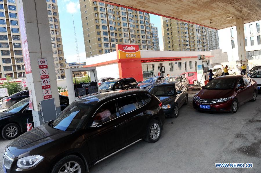 Китай повышает розничные цены на топливо (3)