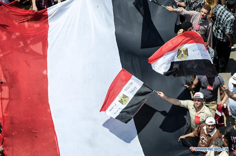 В первую годовщину прихода к власти президента Мухаммеда Мурси в Египте прошли миллионные демонстрации (2)