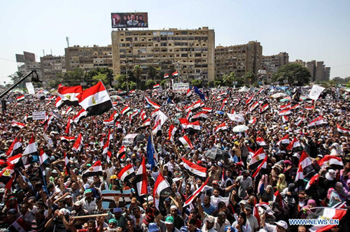 В первую годовщину прихода к власти президента Мухаммеда Мурси в Египте прошли миллионные демонстрации (4)