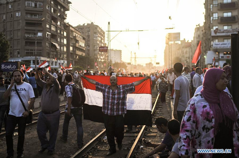В первую годовщину прихода к власти президента Мухаммеда Мурси в Египте прошли миллионные демонстрации (5)