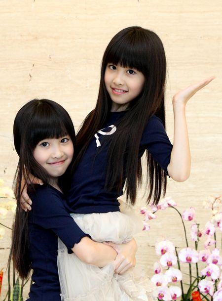 Популярные сестры-близнецы в Китае