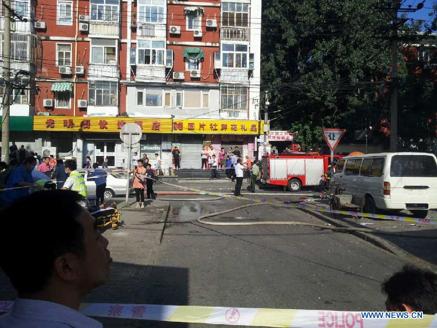 В одном из кондитерских магазинов Пекина прогремел взрыв, пострадали несколько человек (7)