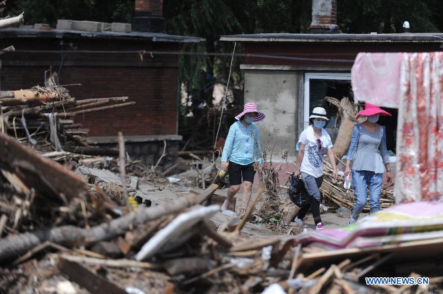 63 человека погибли, 101 пропал без вести в результате наводнений в провинции Ляонин (3)