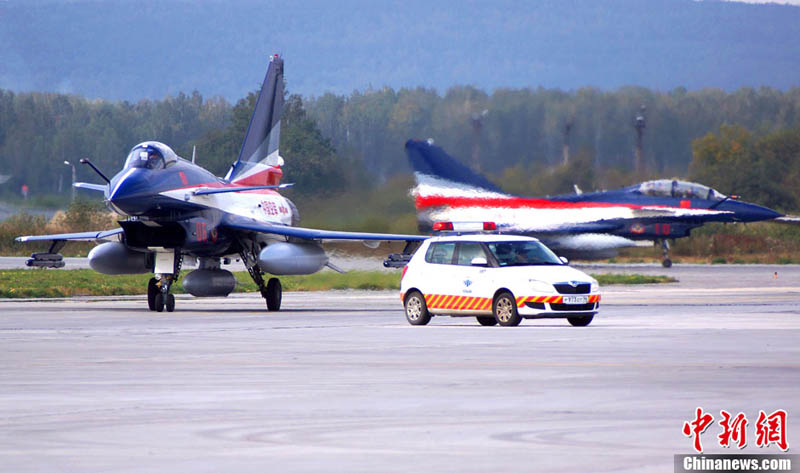 Пилотажная группа «Баи» ВВС НОАК вернулась из Москвы в Китай (5)
