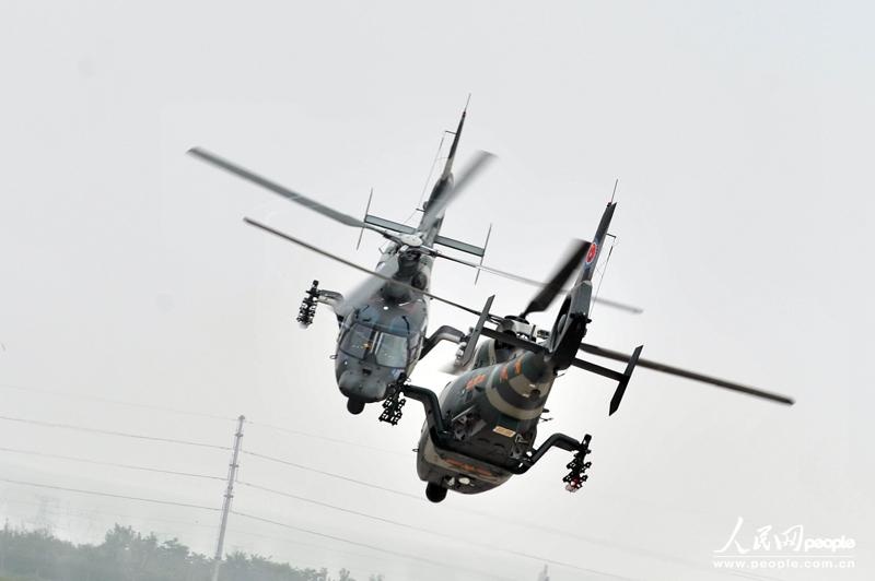 Пилотажная группа сухопутных войск Китая впервые появилась на выставке вертолетов (26)
