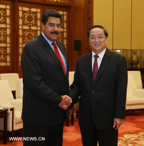 Юй Чжэншэн встретился с президентом Венесуэлы Н. Мадуро