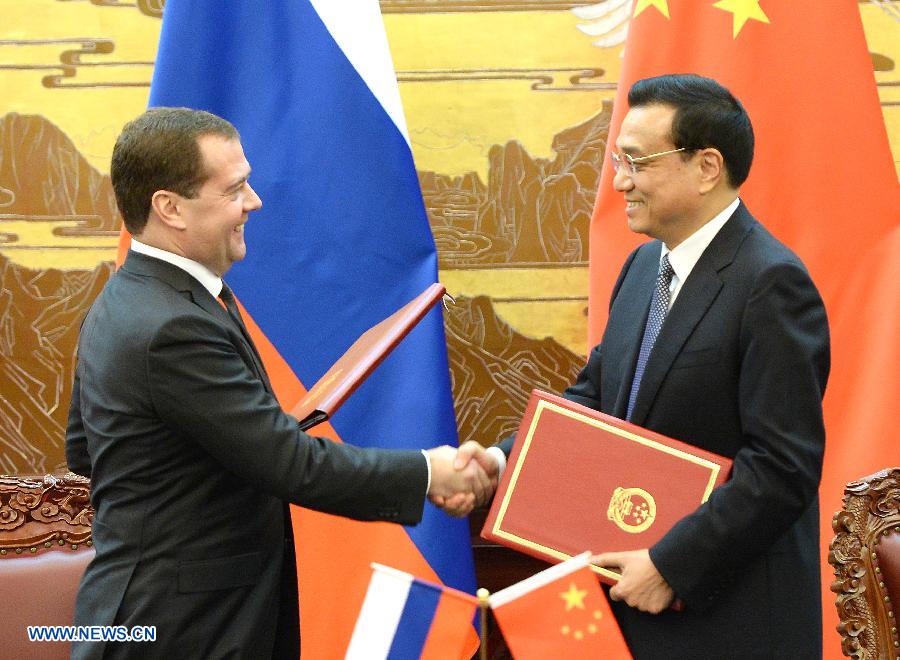 Ли Кэцян и Д. Медведев решили всесторонне углублять многоотраслевое сотрудничество и вывести на новый уровень китайско-российские всесторонние отношения стратегического взаимодействия и партнерства (2)