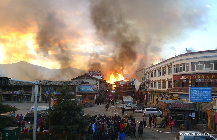Потушен огонь в уезде Шангри-Ла китайской провинции Юньнань (7)