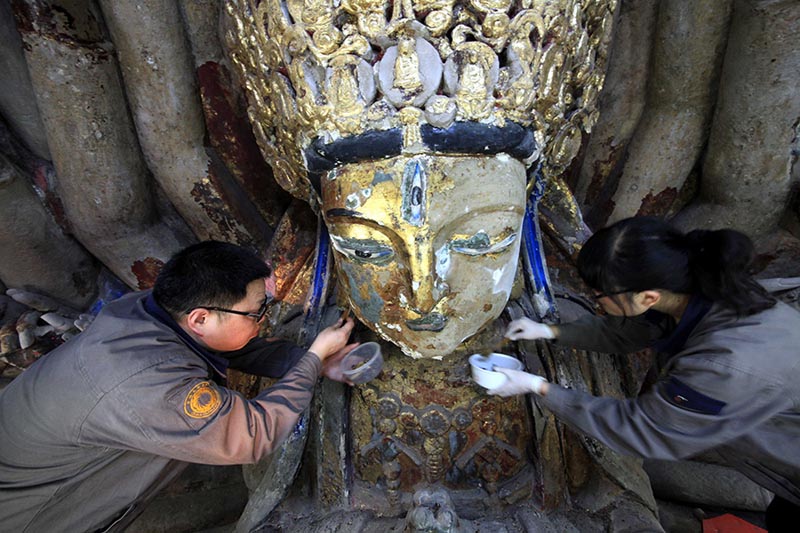В Чунцине началась реставрация главной статуи Тысячерукой Гуаньинь (8)